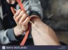 male-junkie-with-syringe-doing-an-injection-dose-PDDTHG.jpg