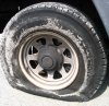 Flat_tire_edited_size.jpg