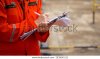 action-safety-officer-full-ppe-600w-2335042111.jpg