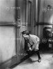 teenage-boy-peeping-through-keyhole.jpg