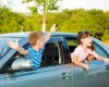 7955225-cute-preschoolers-shouting-from-the-car-windows.jpg