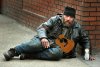 trampwitguitar.jpg