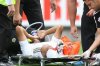 swansea-city-s-neil-taylor-is-treated-on-the-field-669179392.jpg